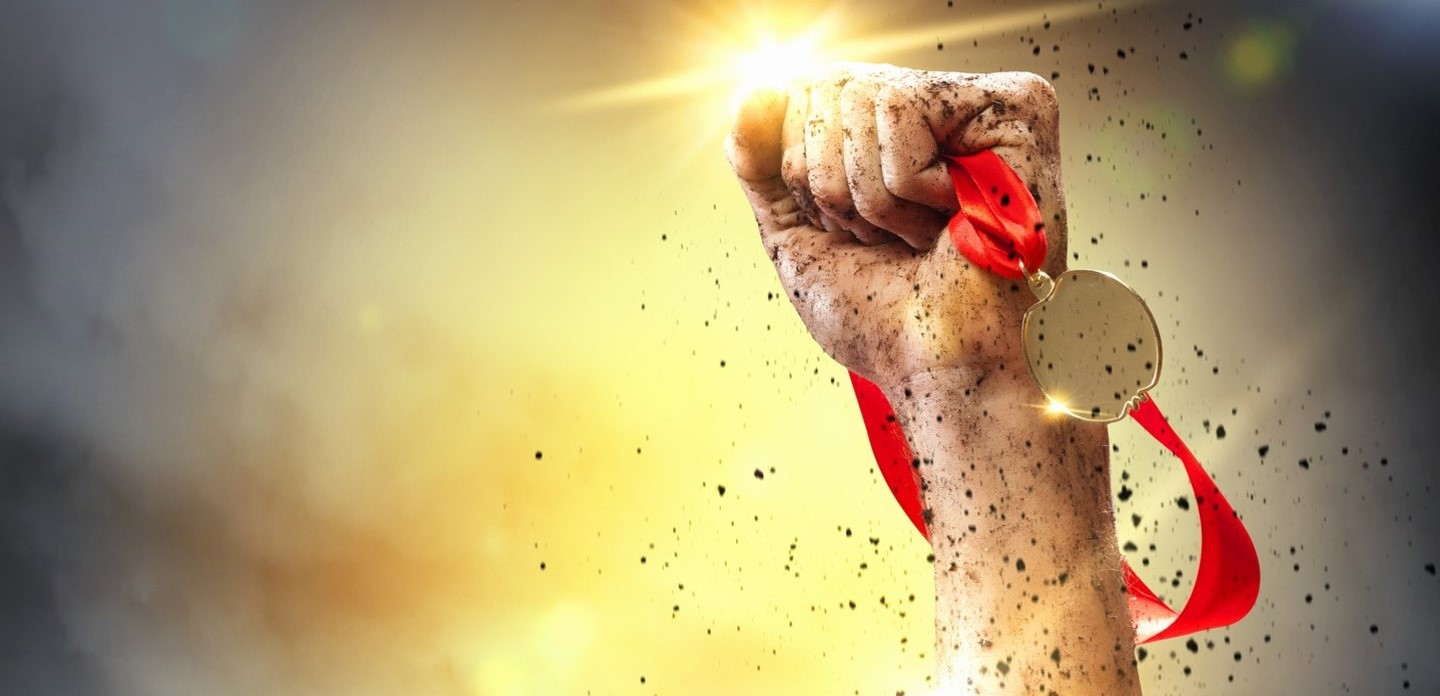 Bild Faust mit Medalie